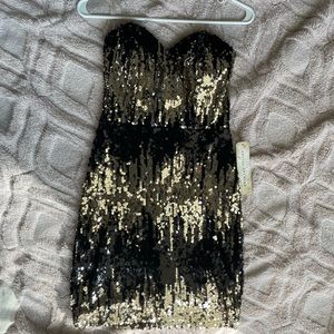 New sequin nye party dress silver and black size small. Strapless zip up dress